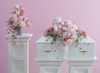 Pink Infant Casket Spray with Plush Animal