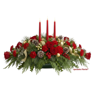jasper - Red taper candles and fragrant Christmas greens highlight this festive mix of red roses, miniature carnations and hypericum berries